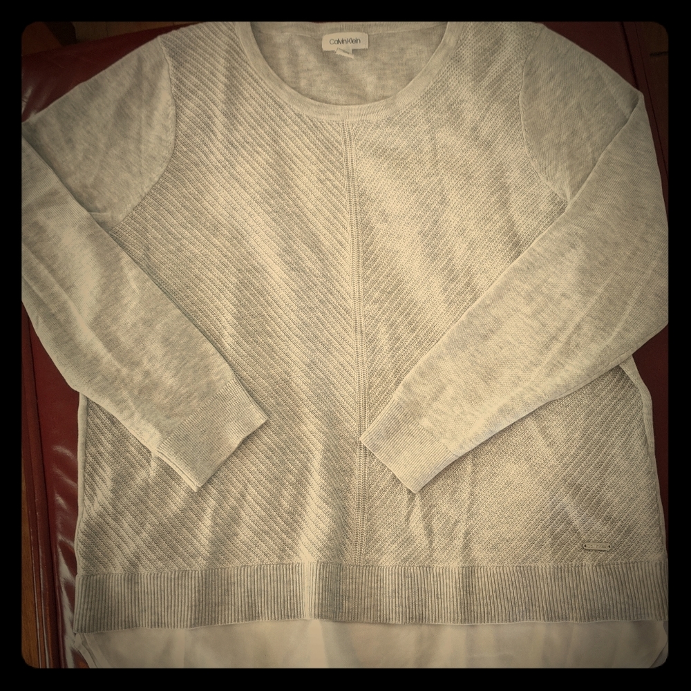 Beautifully detailed light gray sweater